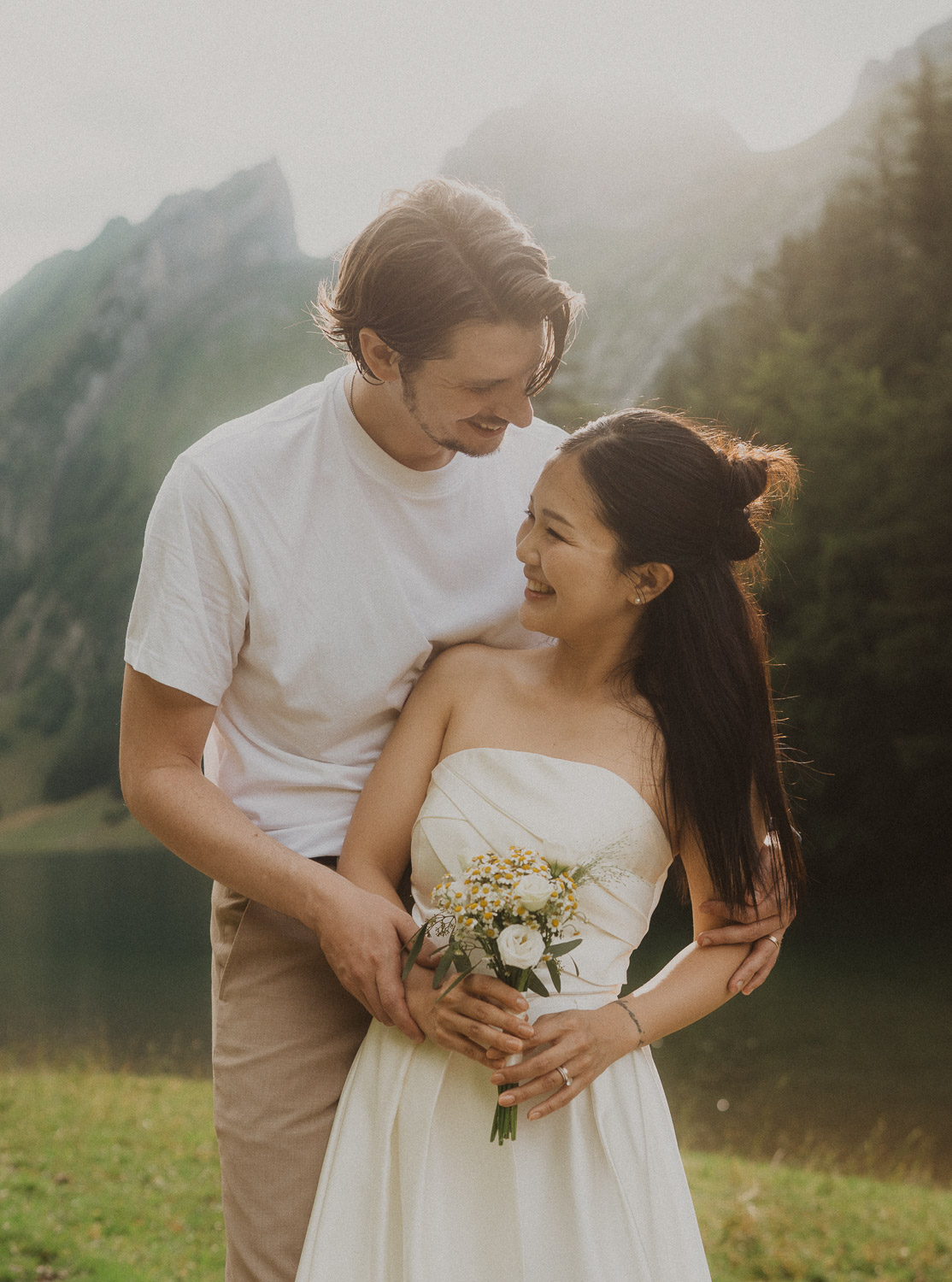Couple eloping at Seealpsee in Appenzell, photographed by an elopement and proposal photographer.