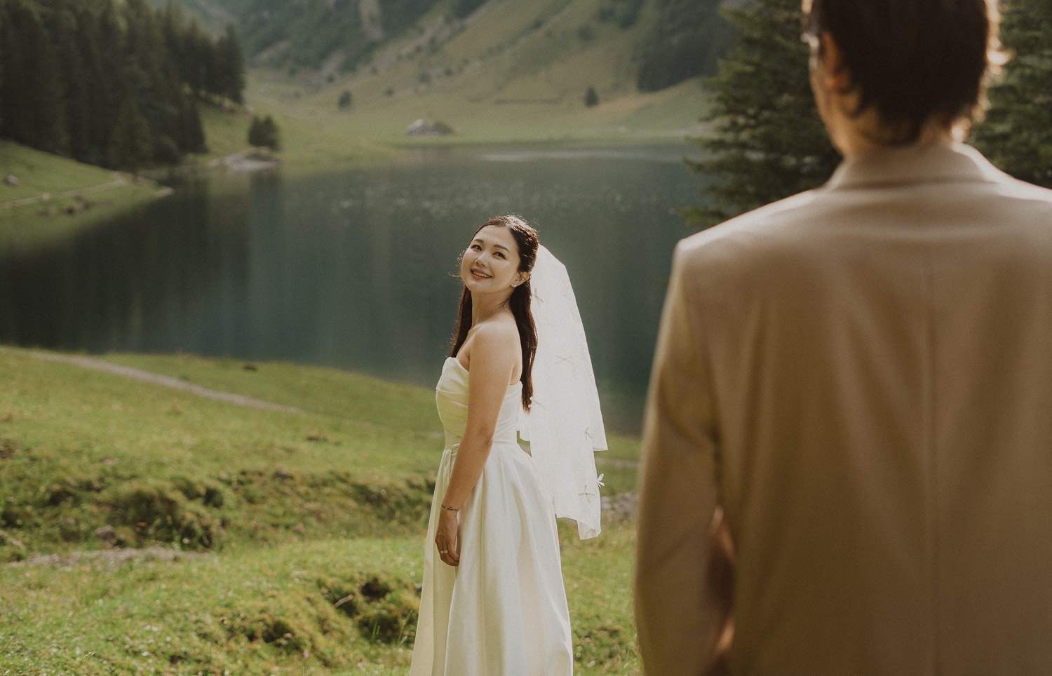 Couple eloping at Seealpsee in Appenzell, photographed by an elopement and proposal photographer.