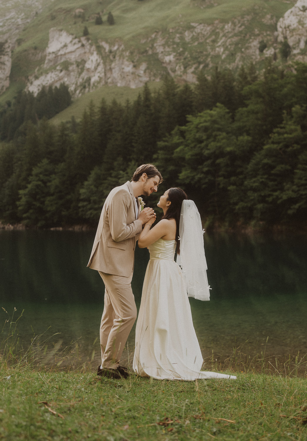 Couple eloping at Seealpsee in Appenzell, photographed by an elopement and proposal photographer.