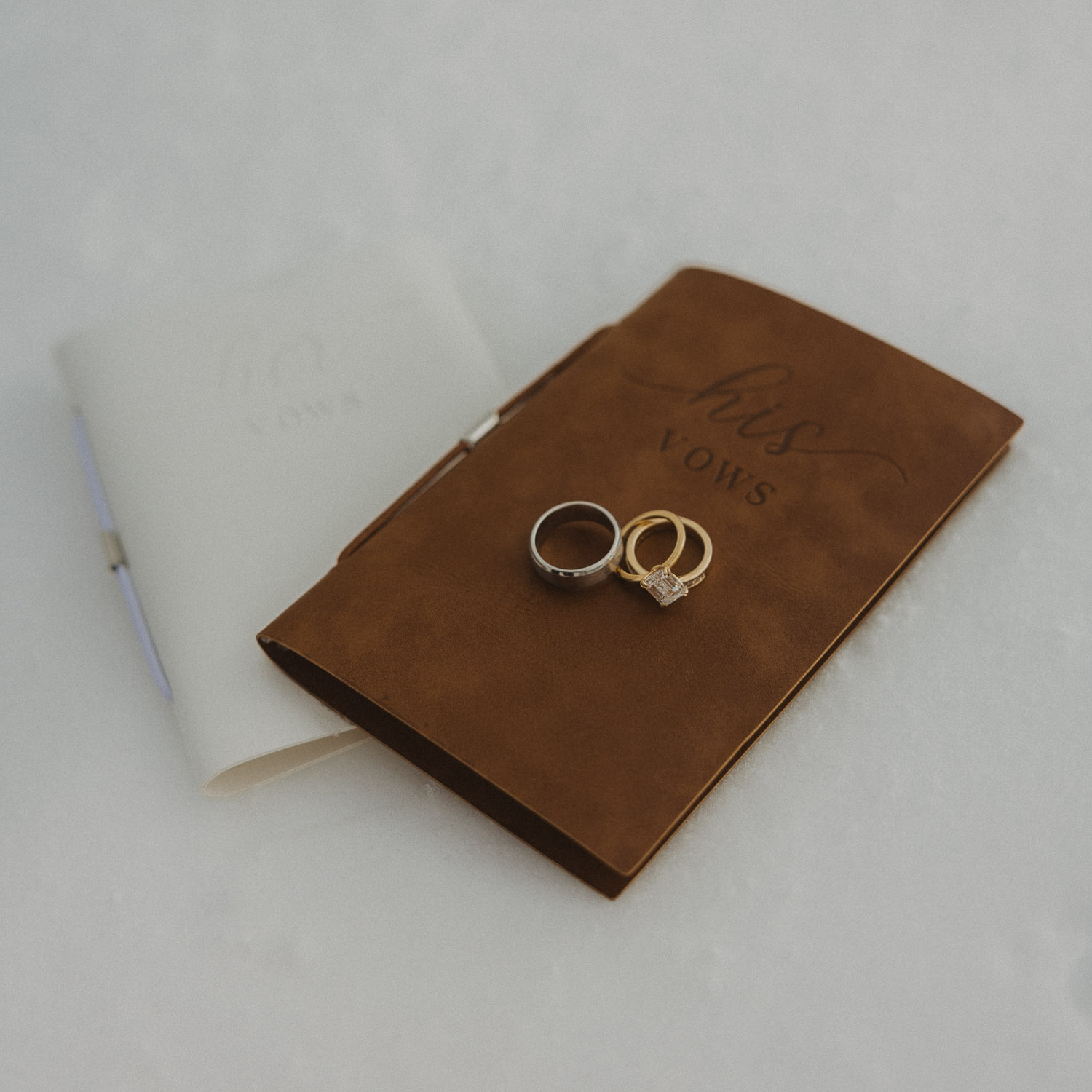 Couple vows on an elopement photography session in Lucerne with snow-covered alpine mountains and a lakeside backdrop.
